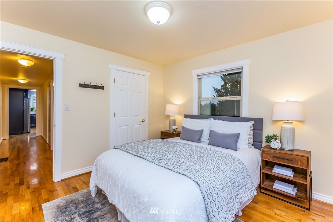 6009 Cady Road Everett, WA 98203 - Photo 20 of 40 a bedroom with a bed and a lamp on dresser