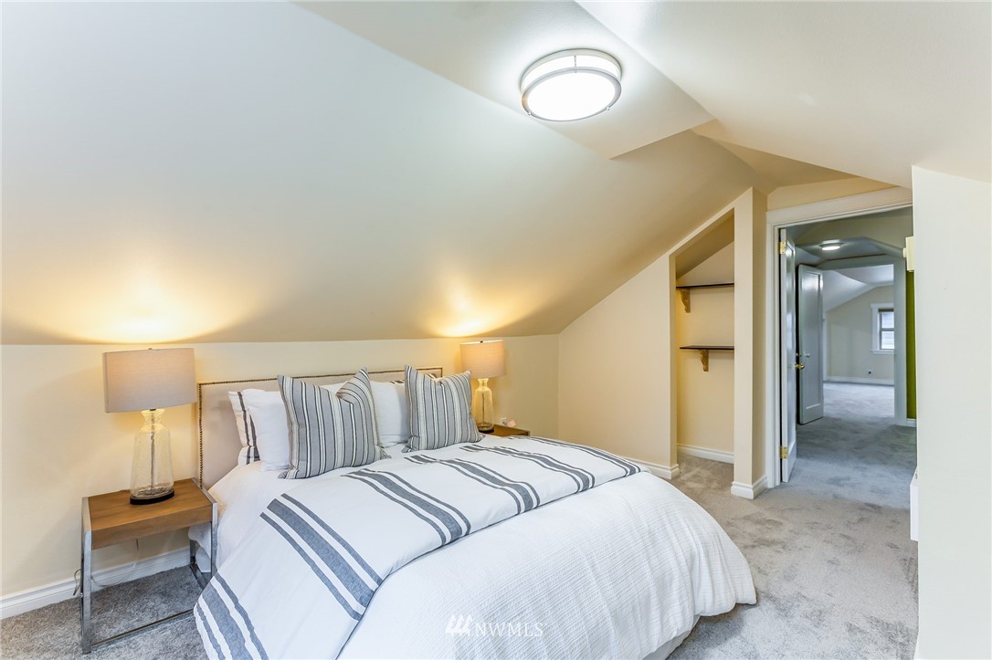 6009 Cady Road Everett, WA 98203 - Photo 24 of 40 a bedroom with a bed and a lamp