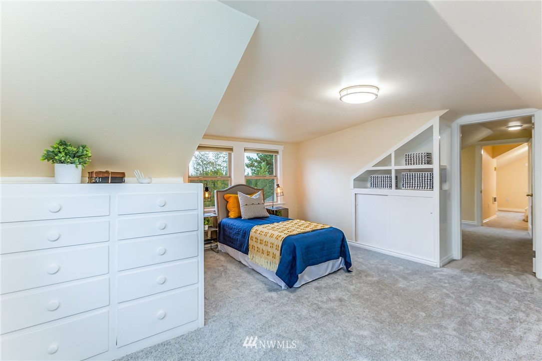6009 Cady Road Everett, WA 98203 - Photo 27 of 40 a bedroom with a bed and a window