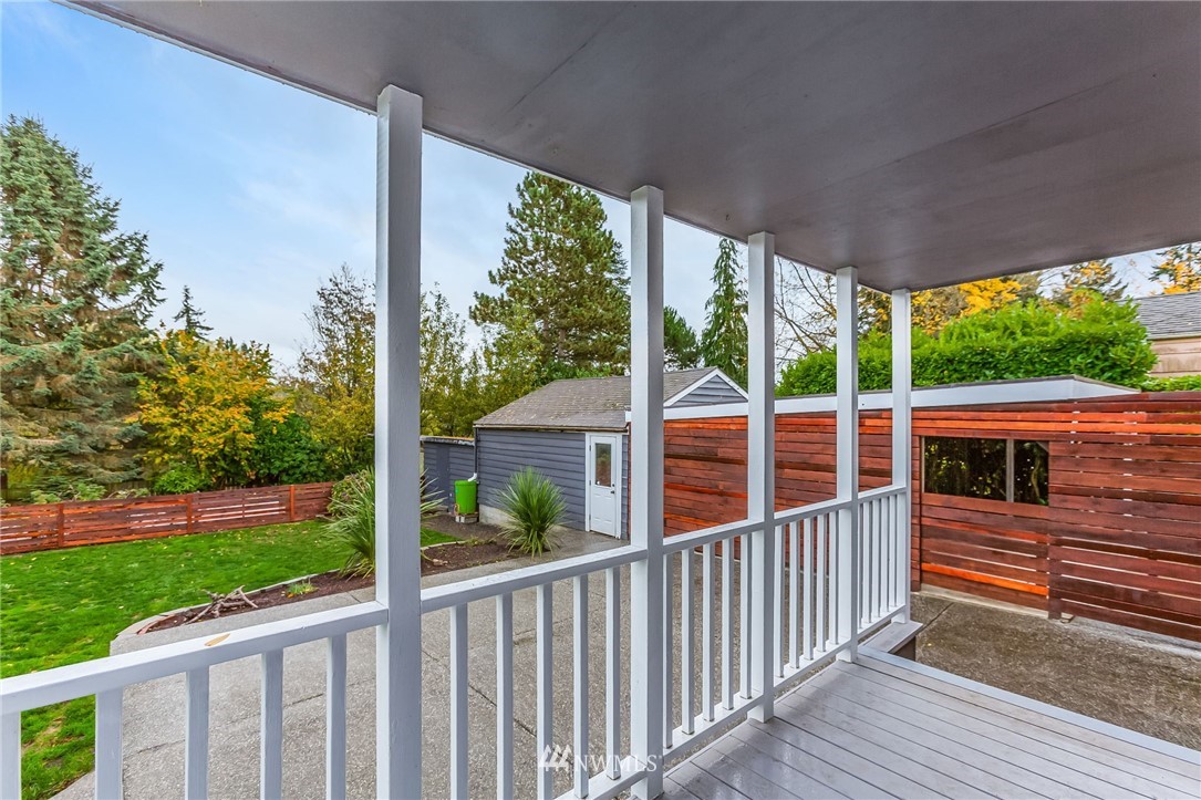 6009 Cady Road Everett, WA 98203 - Photo 29 of 40 a view of a porch with wooden floor and yard