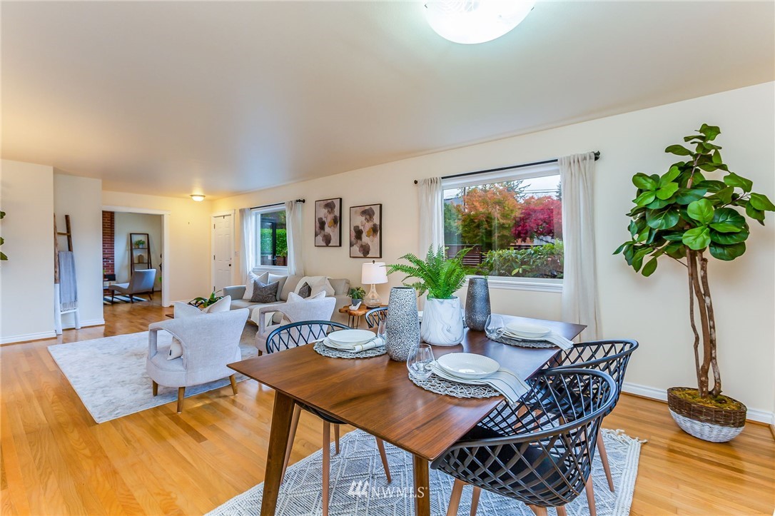 6009 Cady Road Everett, WA 98203 - Photo 8 of 40 a view of a dining room with furniture window and wooden floor