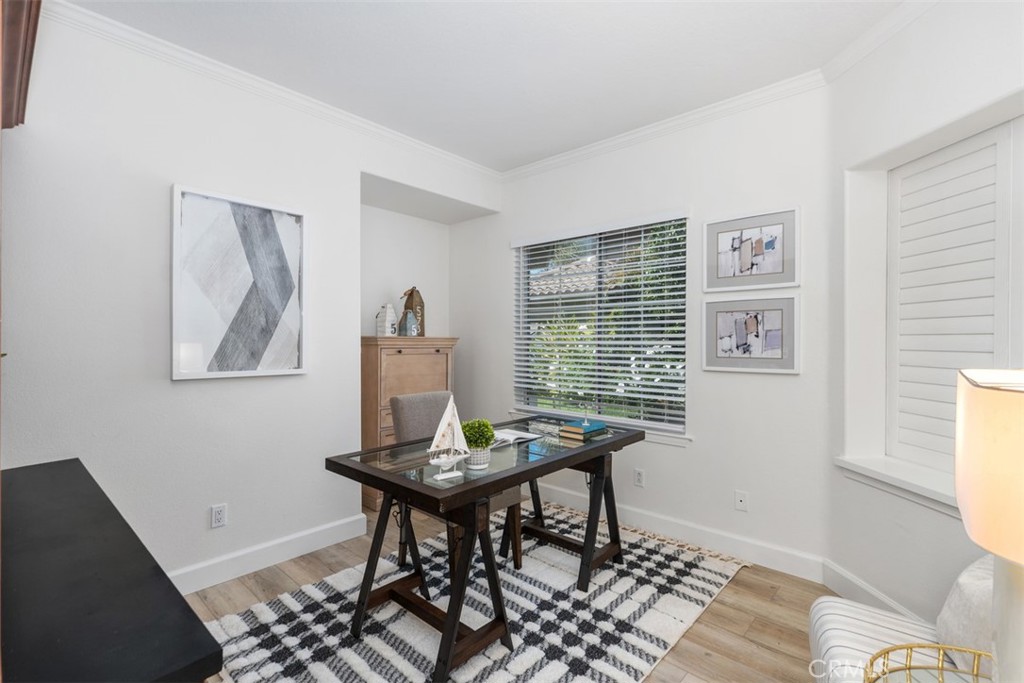 24882 Summerwind Dana Point, CA 92629 - Photo 12 of 31 a view of a workspace with furniture and a window