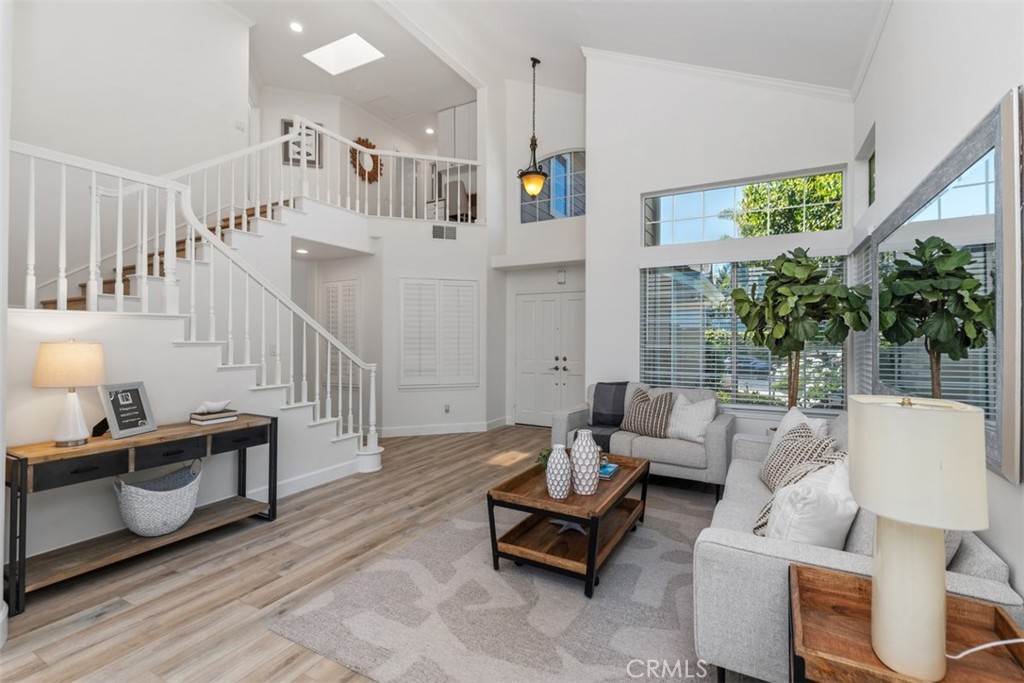 24882 Summerwind Dana Point, CA 92629 - Photo 16 of 31 a living room with furniture and a table