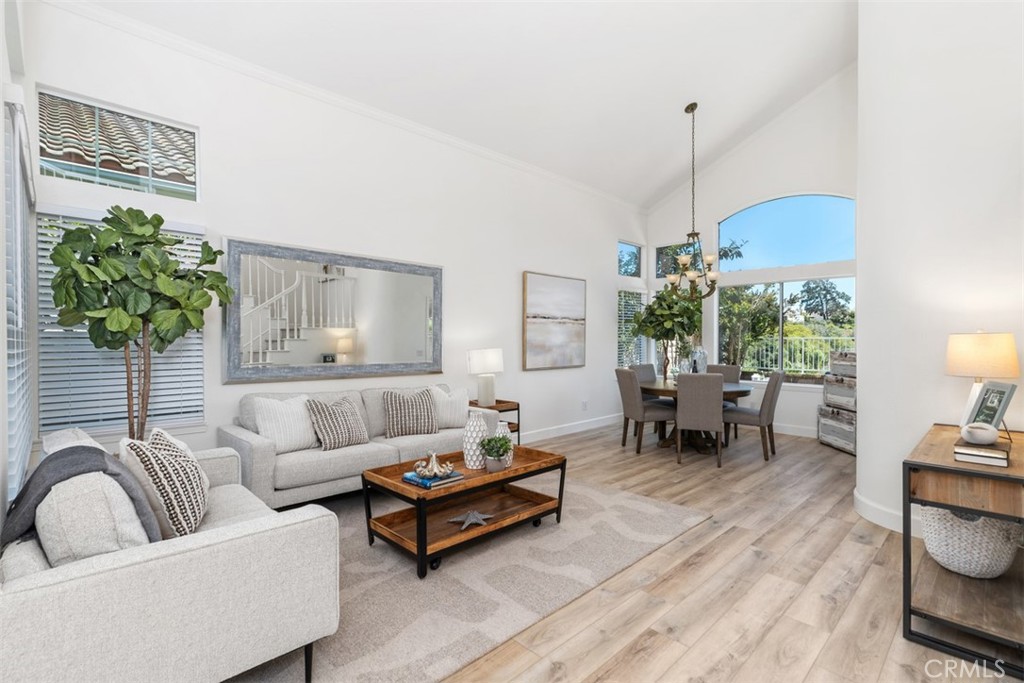 24882 Summerwind Dana Point, CA 92629 - Photo 4 of 31 a living room with furniture and a table