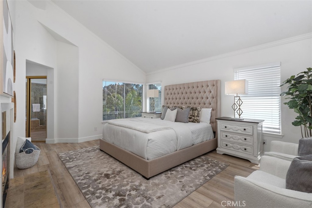 24882 Summerwind Dana Point, CA 92629 - Photo 10 of 31 a bedroom with a large bed and a window