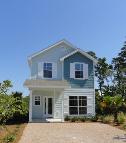 Lot 46 Grayling Way Inlet Beach Inlet Beach, FL 32461 - Photo 1 of 10 a front view of a house with a yard