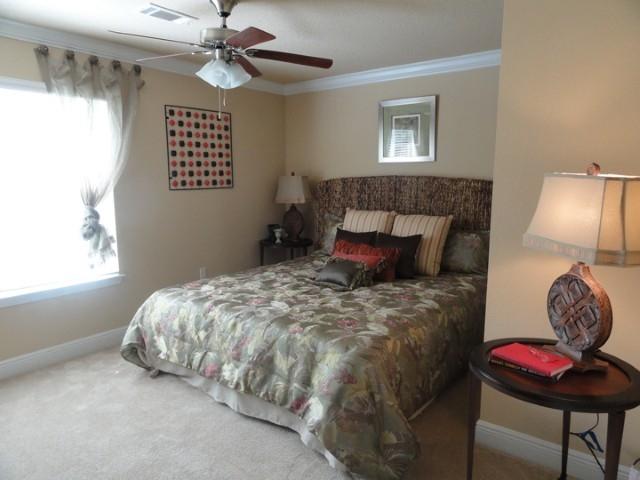 Lot 46 Grayling Way Inlet Beach Inlet Beach, FL 32461 - Photo 6 of 10 a bedroom with a bed and a chair