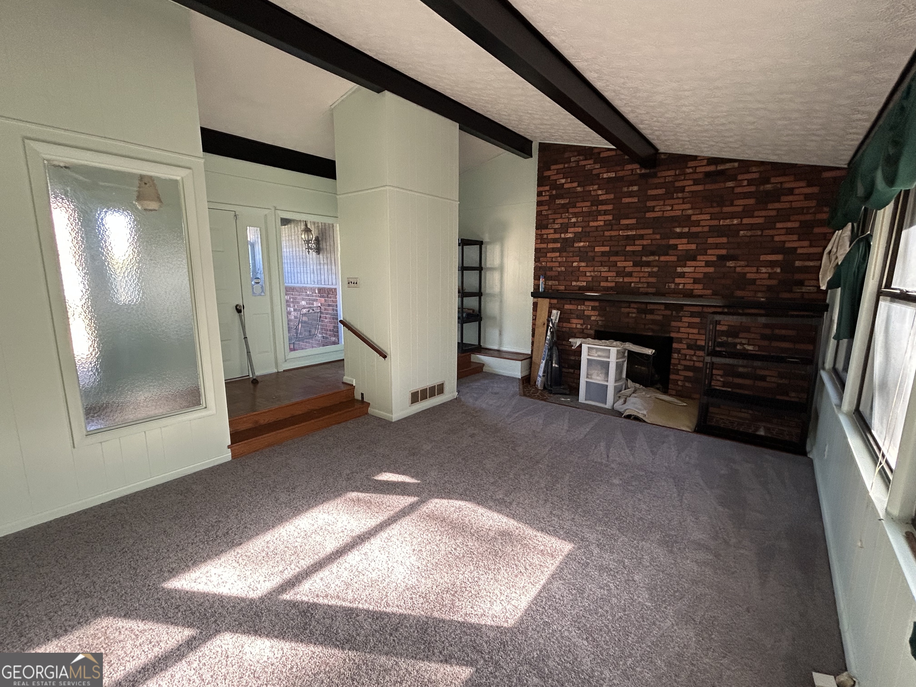 1595 Timothy Road Athens, GA 30606 - Photo 22 of 22 a view of empty room with fireplace and furniture