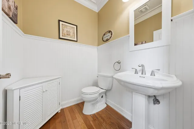 a view of a hallway with windows