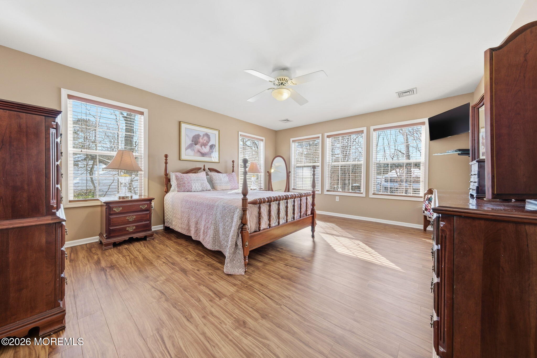 17 Amanda Lane Howell, NJ 07731 - Photo 20 of 35 a bedroom with a bed wooden floor and windows