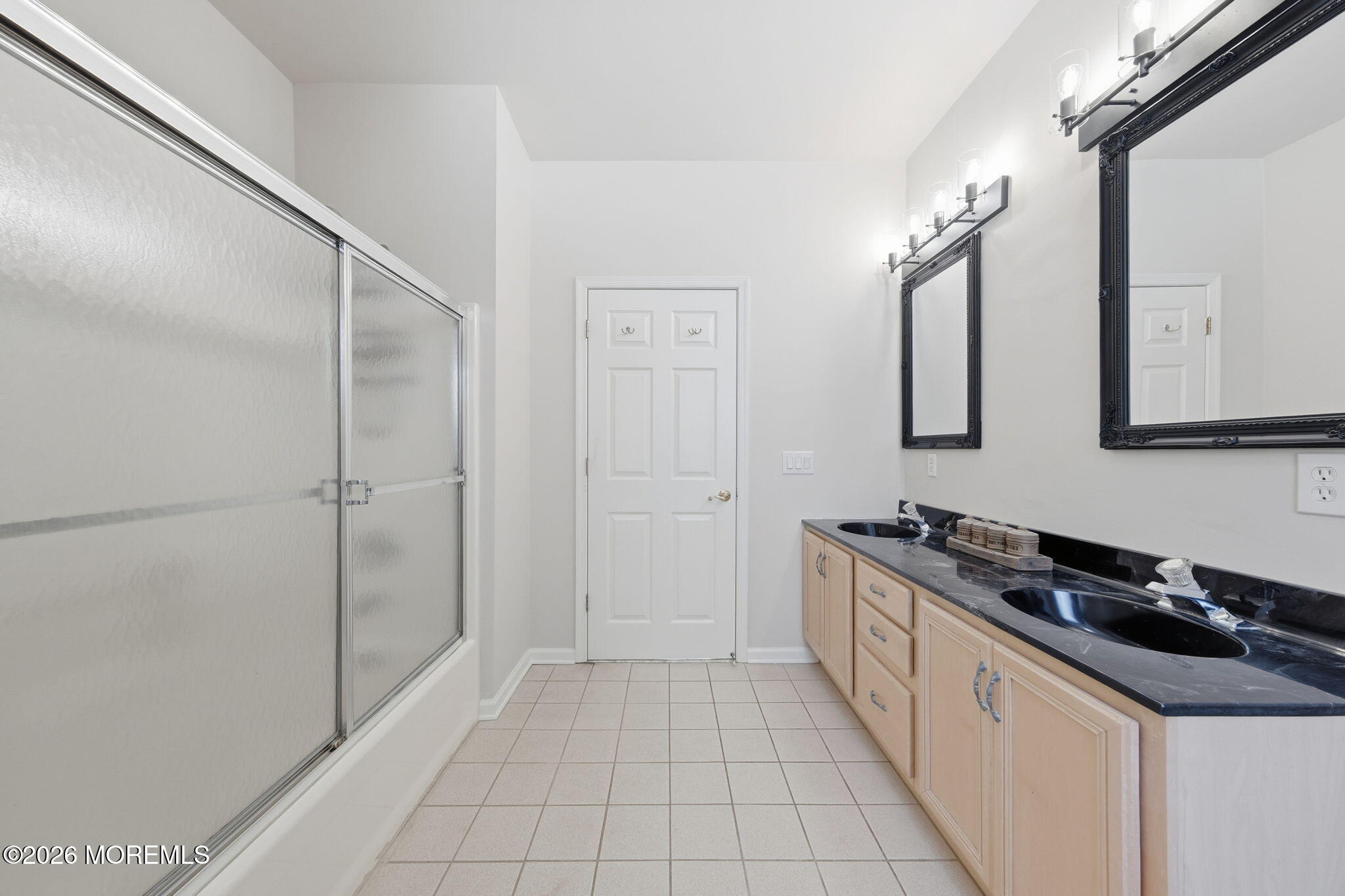 17 Amanda Lane Howell, NJ 07731 - Photo 30 of 35 a bathroom with a granite countertop sink a mirror and a shower