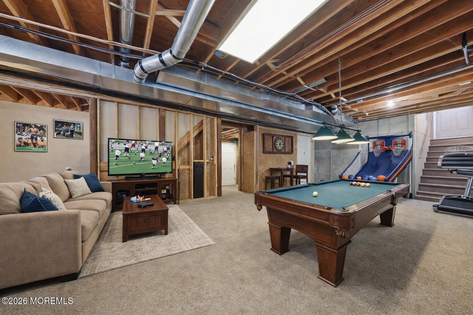 17 Amanda Lane Howell, NJ 07731 - Photo 31 of 35 a living room with furniture and a flat screen tv