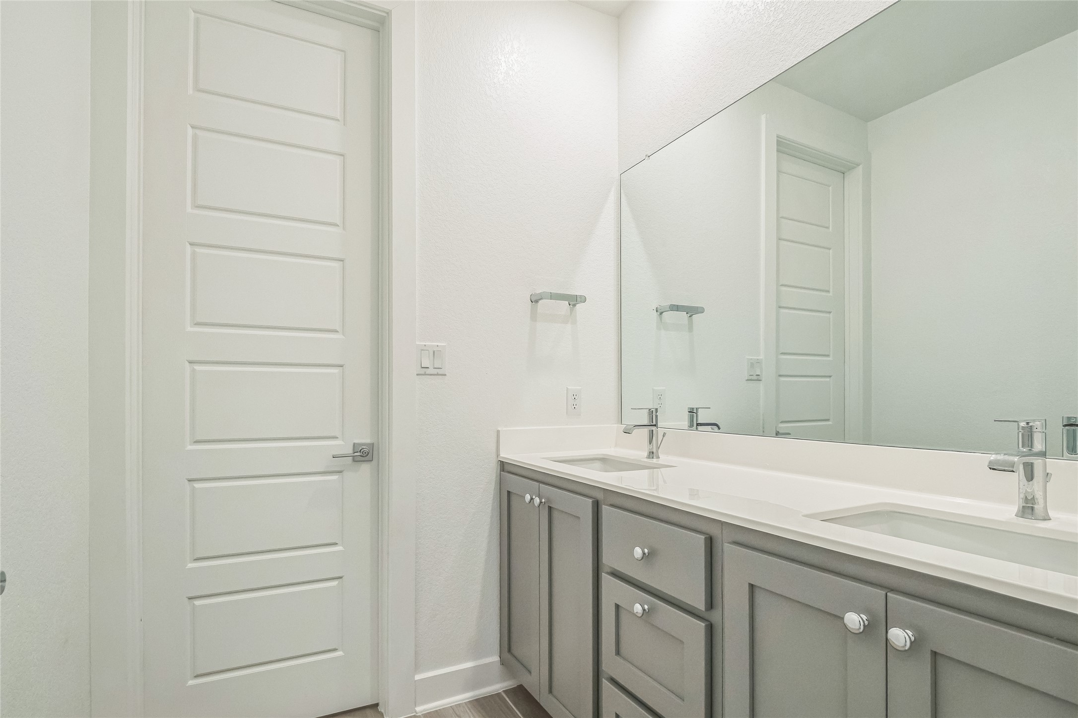 3706 Mesquite Vly Road Georgetown, TX 78628 - Photo 23 of 30 Bathroom with double vanity and baseboards