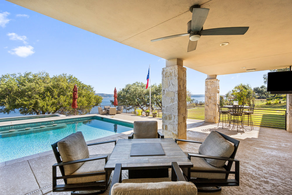 15210 Rainbow 1 Street Austin, TX 78734 - Photo 33 of 40 a balcony with furniture and a potted plant