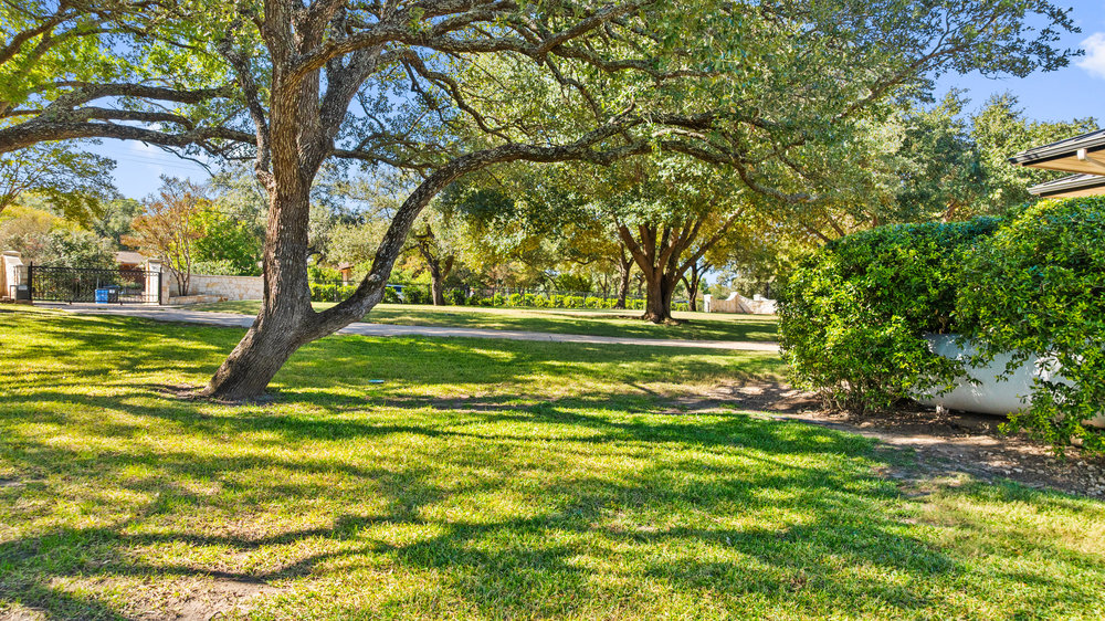 15210 Rainbow 1 Street Austin, TX 78734 - Photo 7 of 40 a view of a trees in a yard