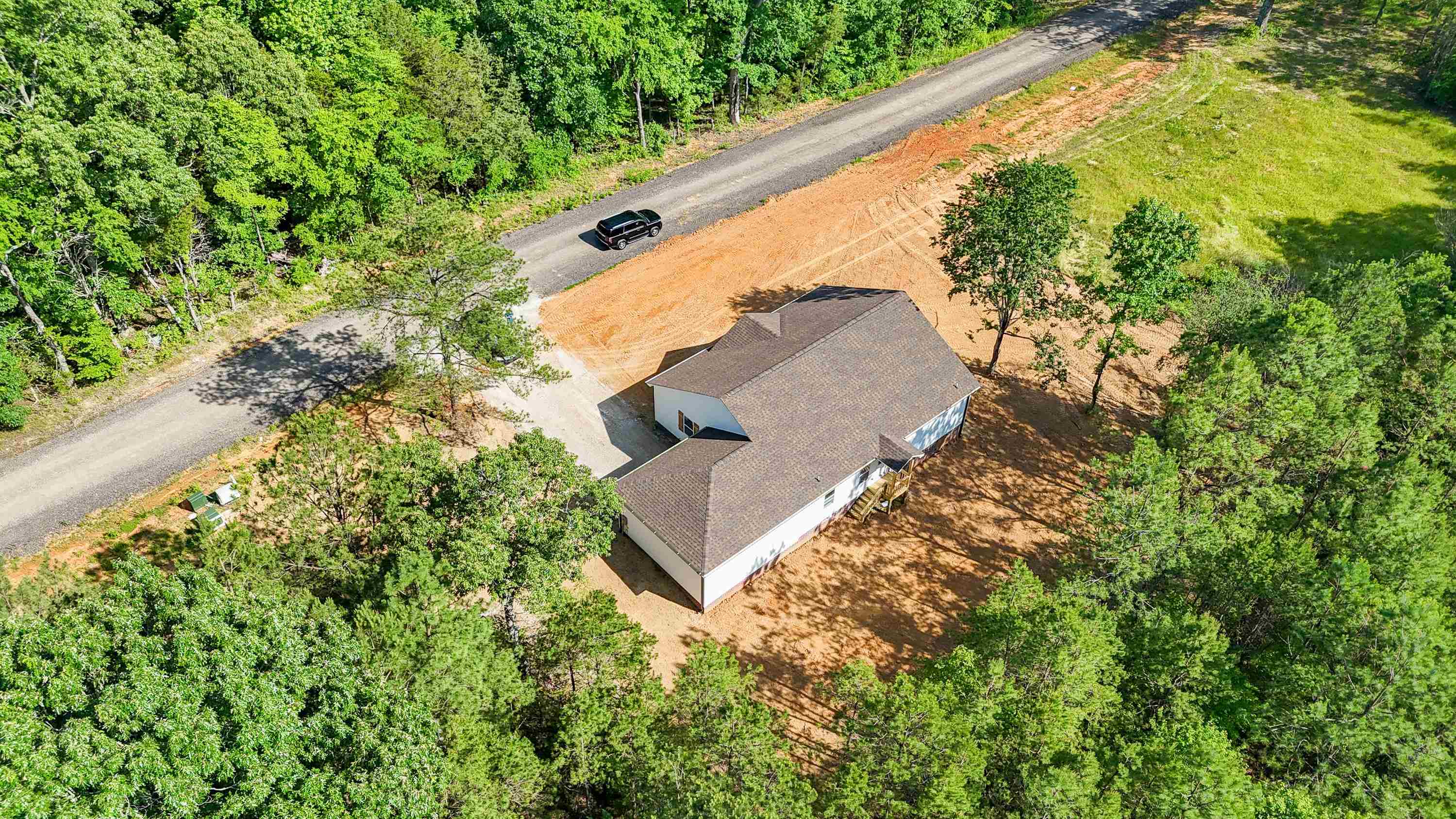 260 Range Road Savannah, TN 38372 - Photo 38 of 40 a view of a yard with a tree