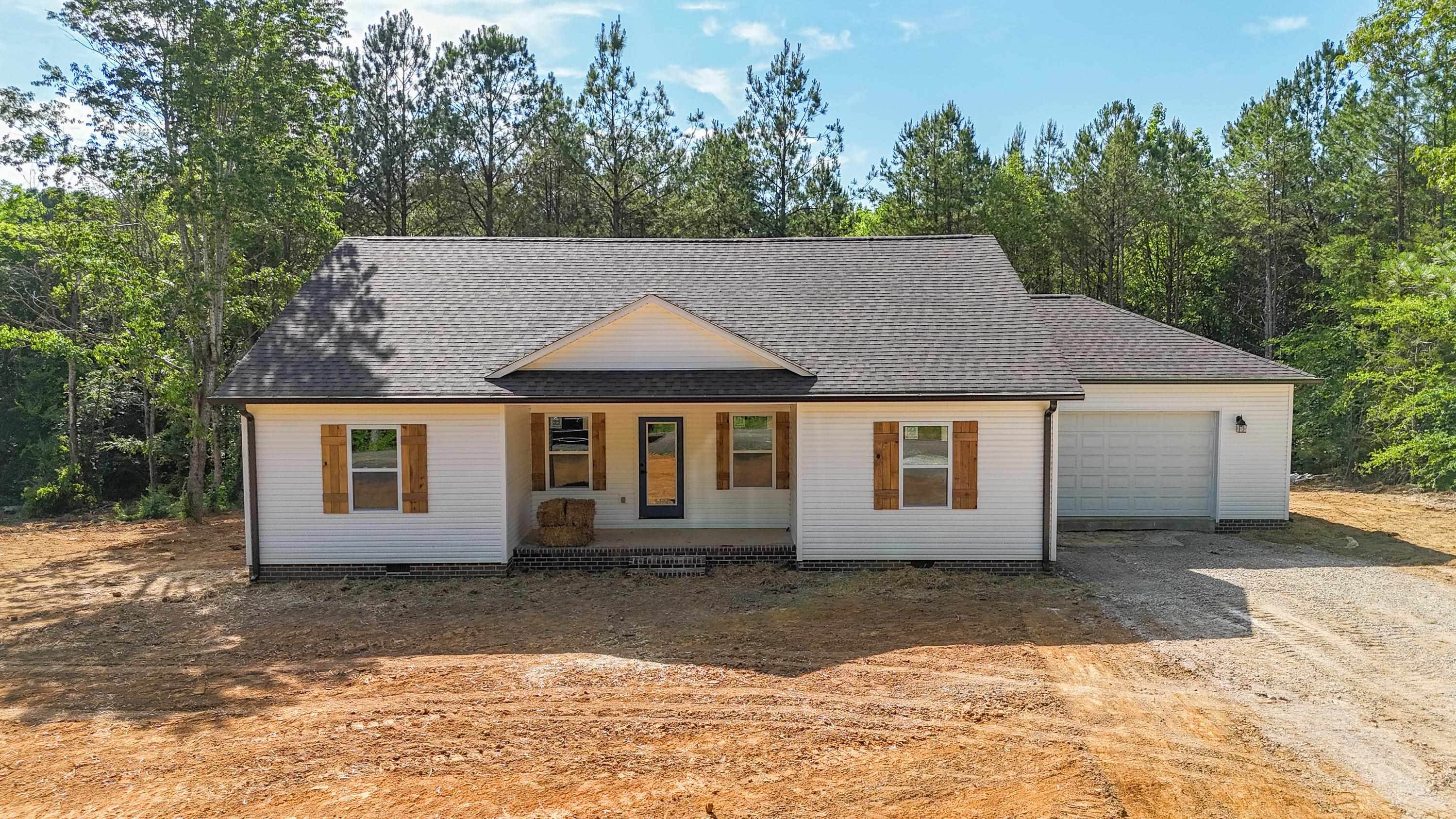 260 Range Road Savannah, TN 38372 - Photo 39 of 40 a front view of a house with a yard