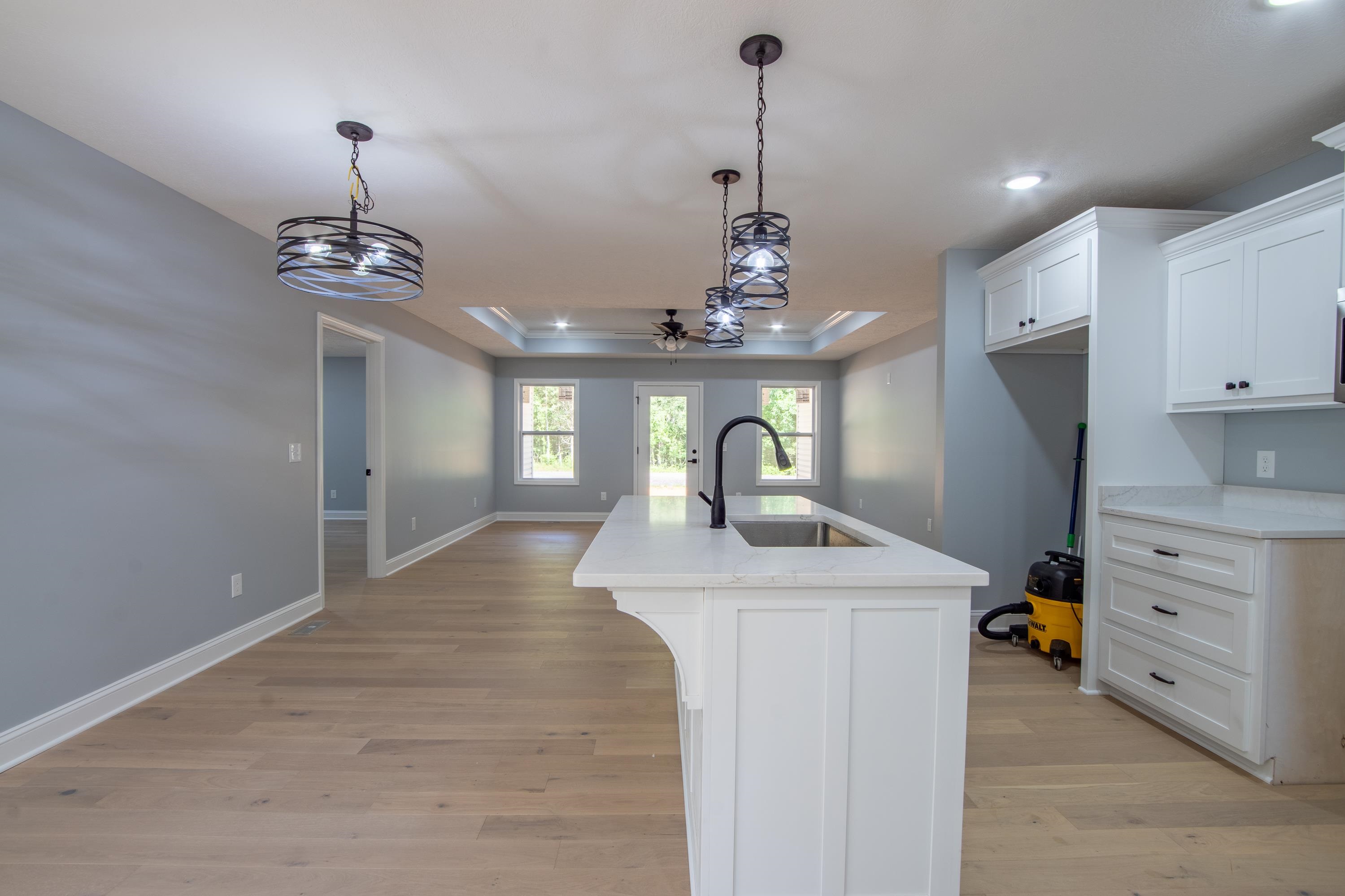 260 Range Road Savannah, TN 38372 - Photo 5 of 40 a view of a kitchen with center island and stainless steel appliances