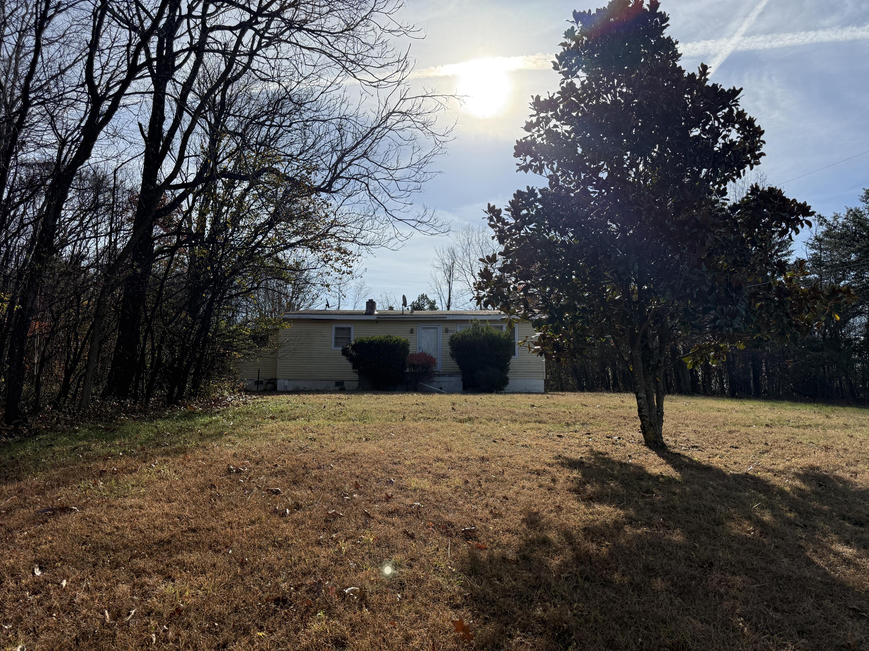 7212 Wood Haven Road Roanoke, VA 24019 - Photo 2 of 39 a backyard of a house with lots of green space