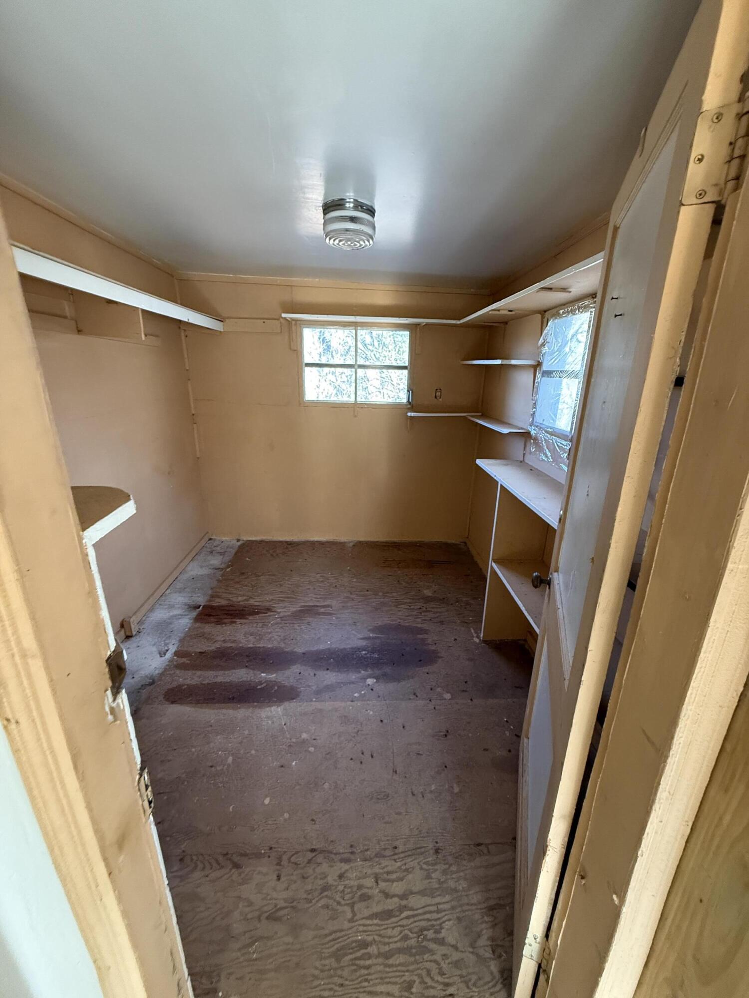 7212 Wood Haven Road Roanoke, VA 24019 - Photo 25 of 39 a view of an empty room with a fireplace