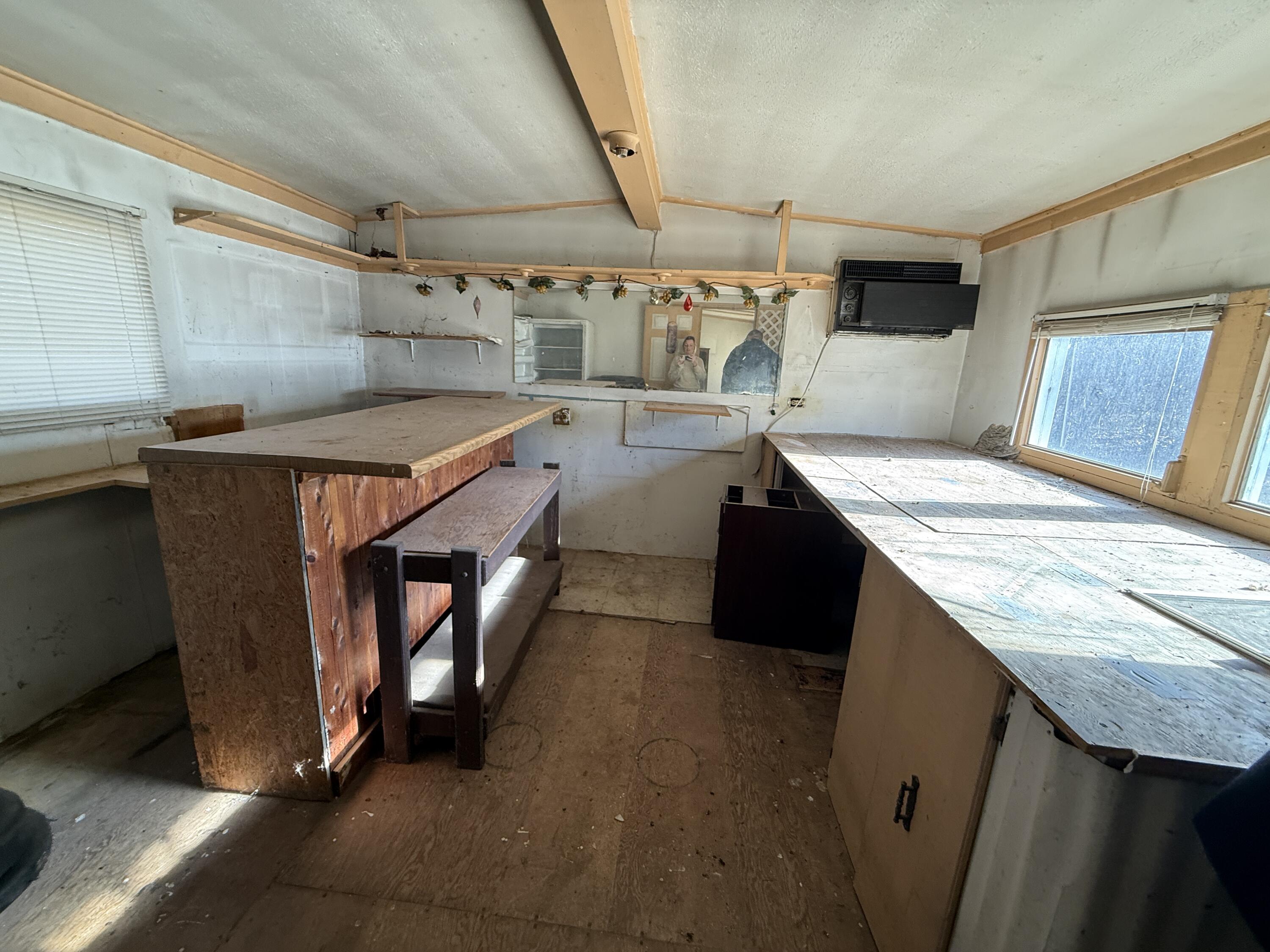 7212 Wood Haven Road Roanoke, VA 24019 - Photo 27 of 39 a view of kitchen with cabinets and wooden floor