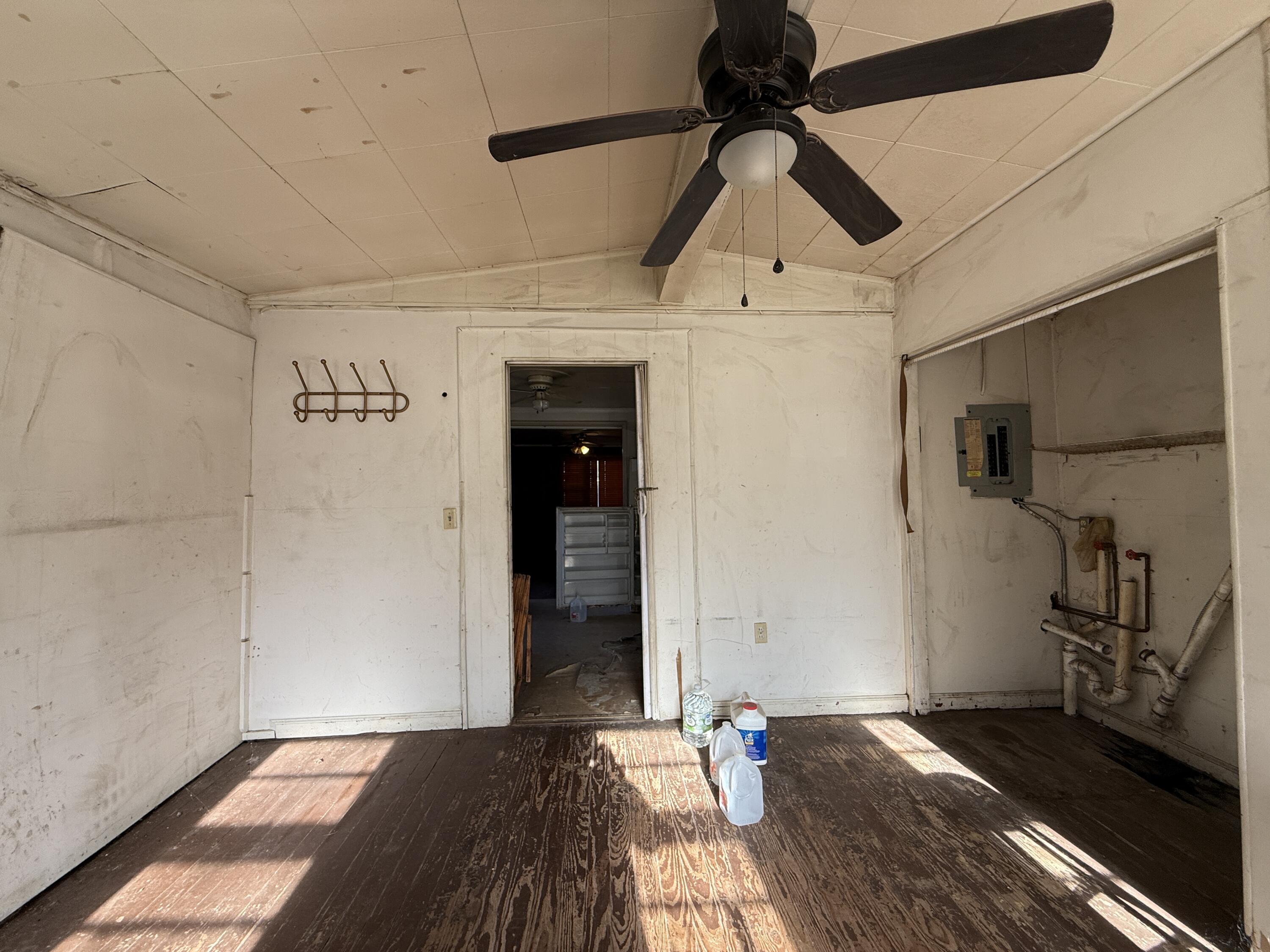 7212 Wood Haven Road Roanoke, VA 24019 - Photo 30 of 39 a bedroom with a bed and a chandelier