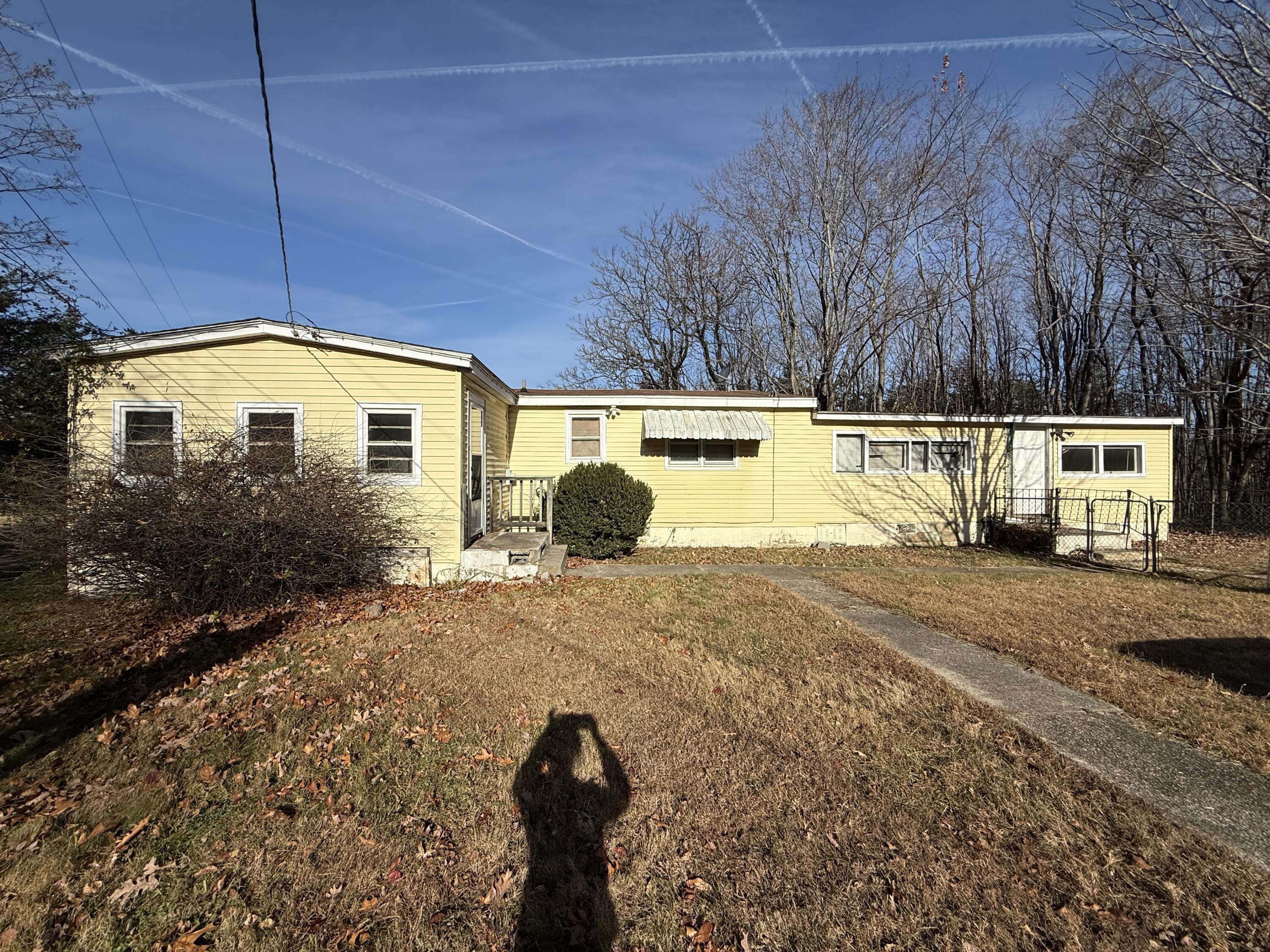 7212 Wood Haven Road Roanoke, VA 24019 - Photo 34 of 39 a view of a house with backyard and tree