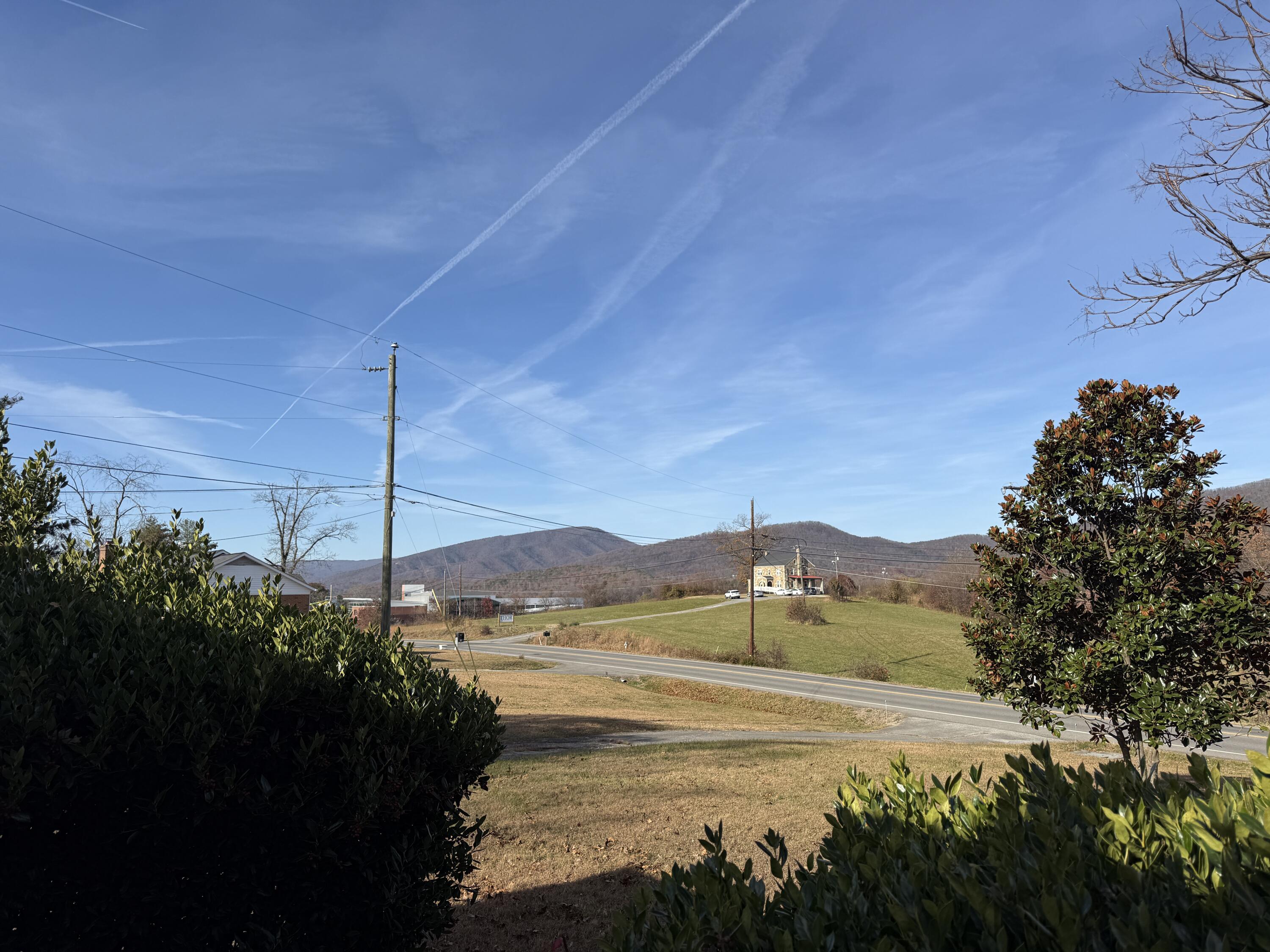 7212 Wood Haven Road Roanoke, VA 24019 - Photo 6 of 39 a view of a water fountain and a floor to ceiling window