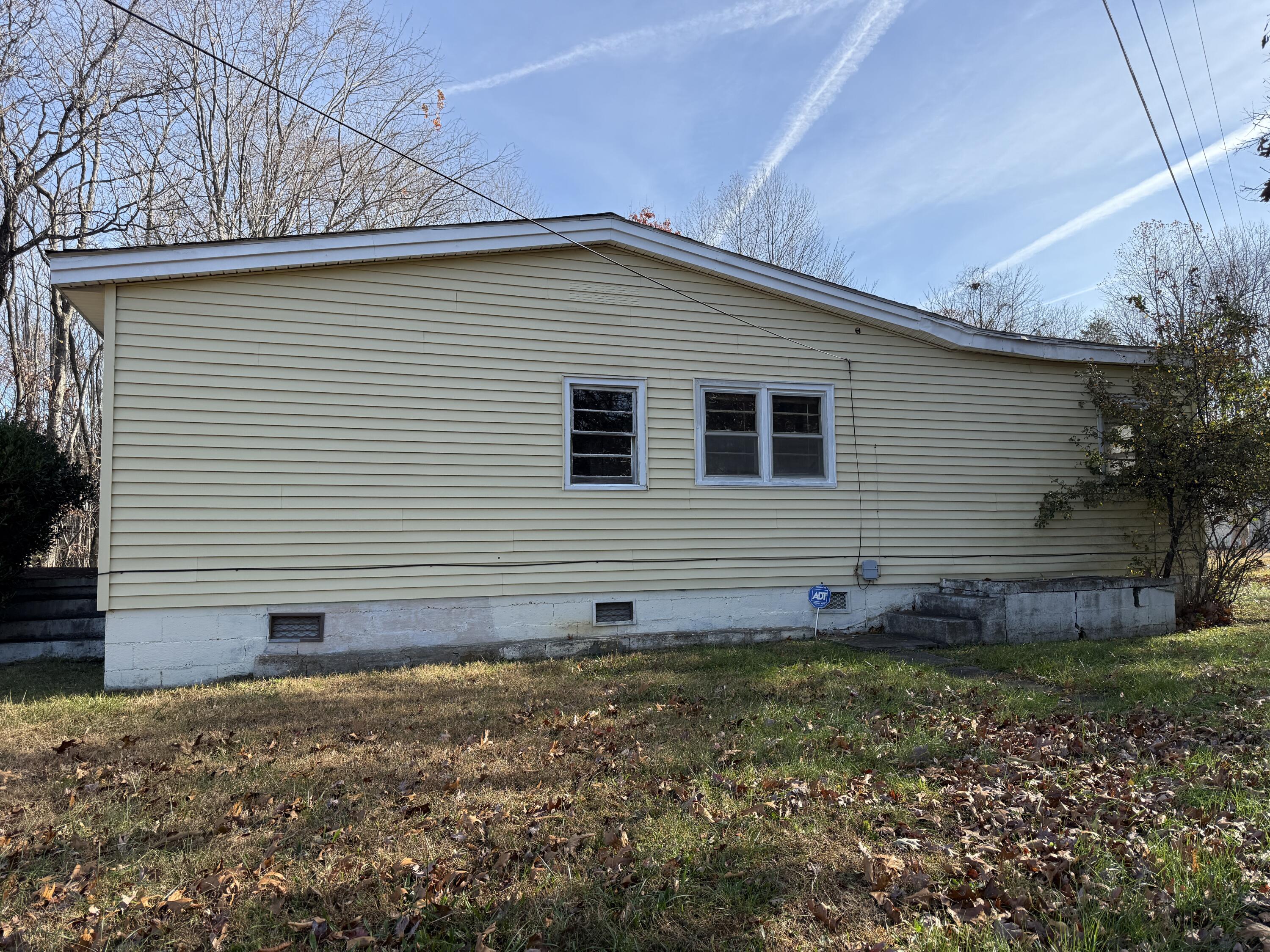 7212 Wood Haven Road Roanoke, VA 24019 - Photo 9 of 39 a view of a house with a yard