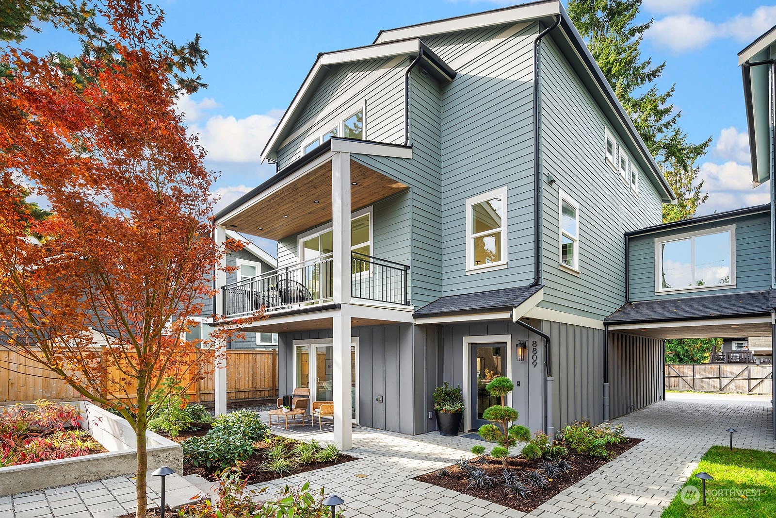 8809 Wallingford Avenue North Seattle, WA 98103 - Photo 1 of 1 a front view of a house with garden