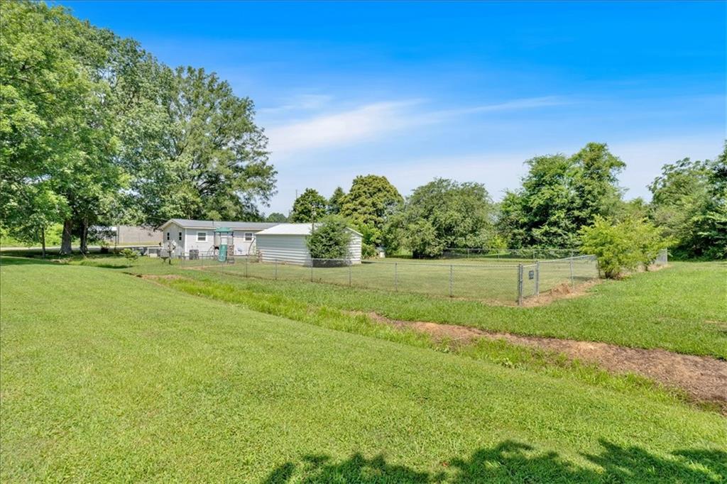 2454 Hall Station Road Northwest Adairsville, GA 30103 - Photo 23 of 35 a view of a park with large trees