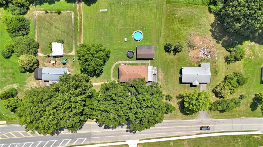 2454 Hall Station Road Northwest Adairsville, GA 30103 - Photo 26 of 35 an aerial view of a house with a yard
