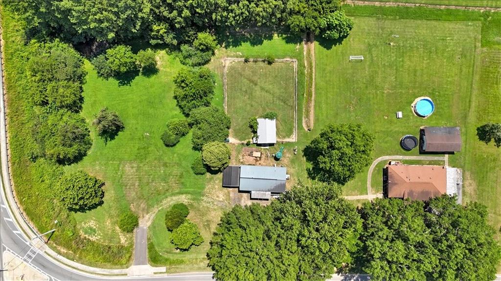 2454 Hall Station Road Northwest Adairsville, GA 30103 - Photo 27 of 35 an aerial view of a house with a garden