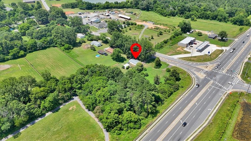 2454 Hall Station Road Northwest Adairsville, GA 30103 - Photo 30 of 35 a view of a garden with a flower garden