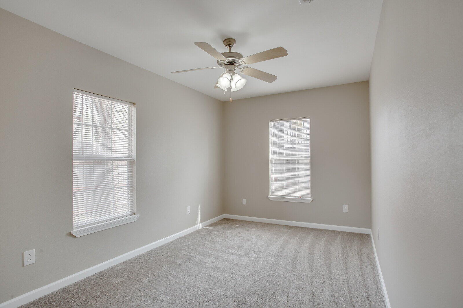 1909 16th Street, Unit FRONT Lubbock, TX 79401 - Photo 10 of 13 a view of an empty room with a window
