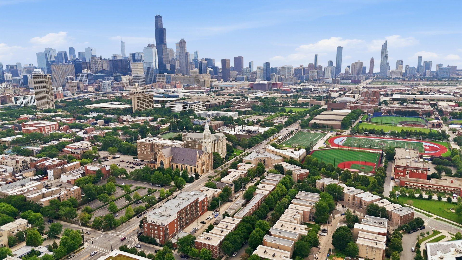 1155 West Roosevelt Road, Unit 404 Chicago, IL 60608 - Photo 28 of 30 a city view with tall buildings