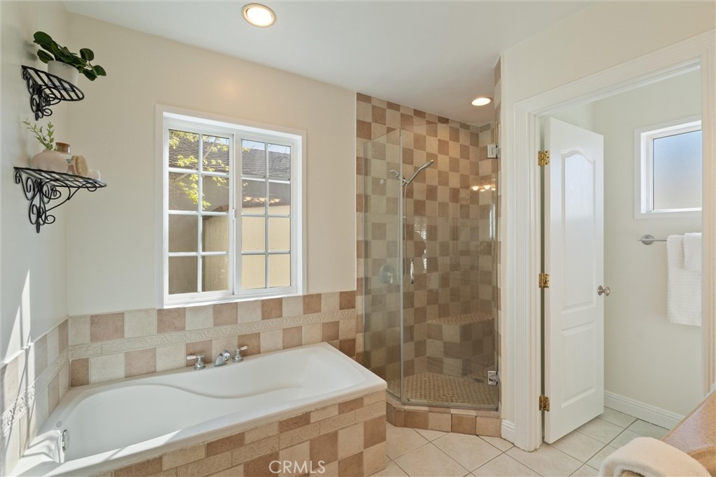 3426 Roxanne Avenue Long Beach, CA 90808 - Photo 11 of 21 a bathroom with a shower and a sink