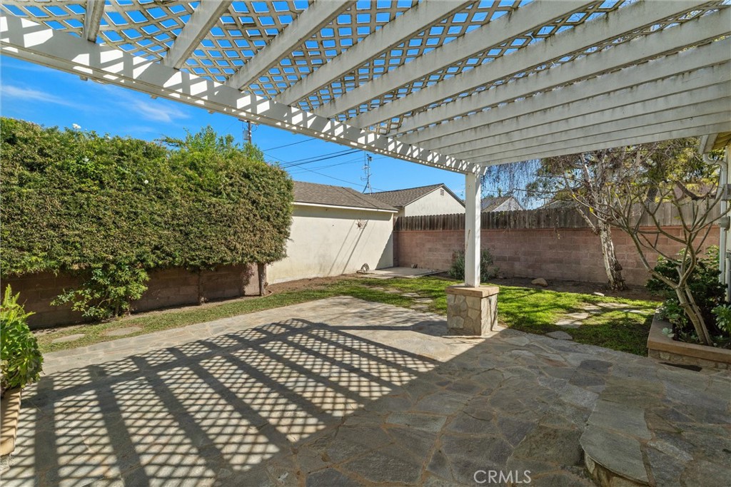 3426 Roxanne Avenue Long Beach, CA 90808 - Photo 18 of 21 a view of a house with a yard