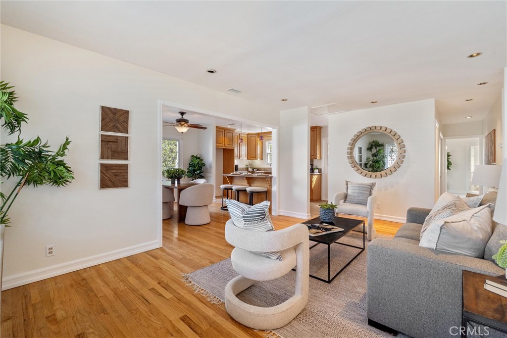 3426 Roxanne Avenue Long Beach, CA 90808 - Photo 2 of 21 a living room with furniture and a large window