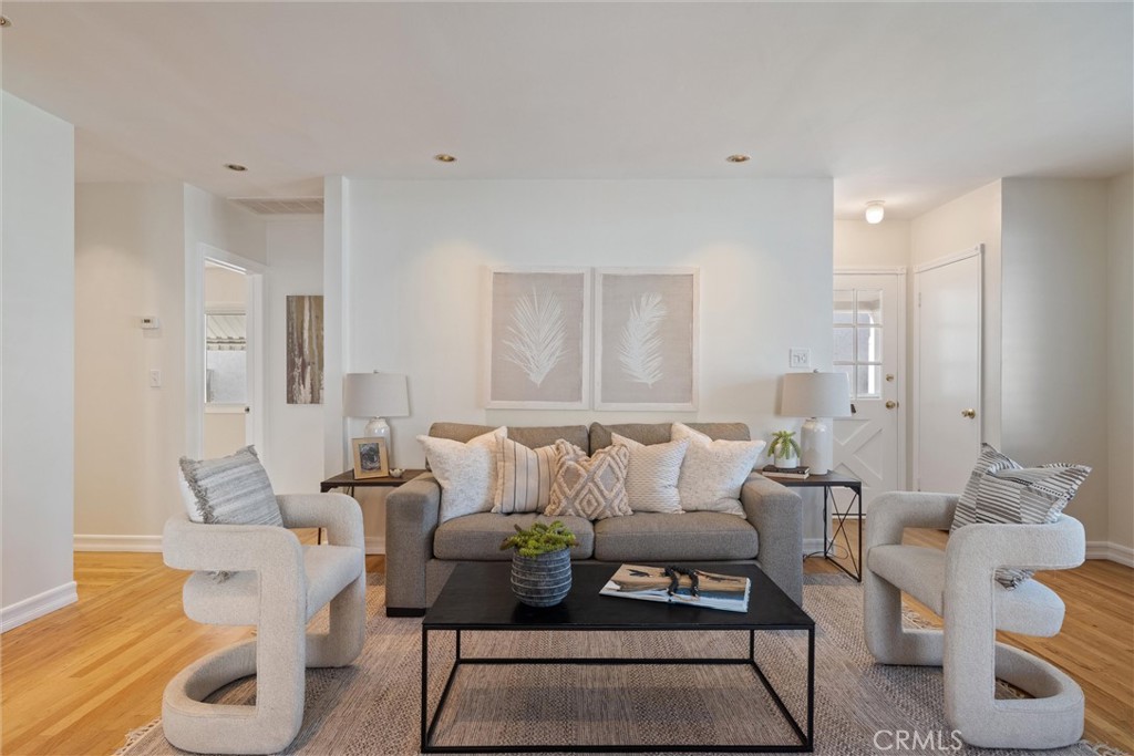 3426 Roxanne Avenue Long Beach, CA 90808 - Photo 3 of 21 a living room with furniture and wooden floor
