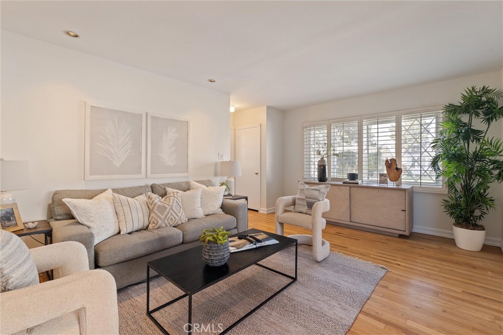 3426 Roxanne Avenue Long Beach, CA 90808 - Photo 4 of 21 a living room with furniture and a potted plant