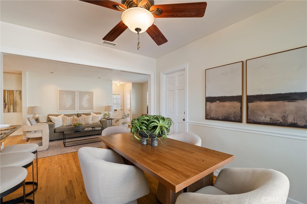 3426 Roxanne Avenue Long Beach, CA 90808 - Photo 6 of 21 a living room with furniture and a potted plant