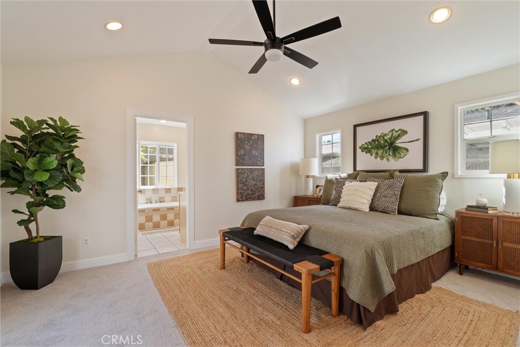 3426 Roxanne Avenue Long Beach, CA 90808 - Photo 9 of 21 a bedroom with a bed and a potted plant