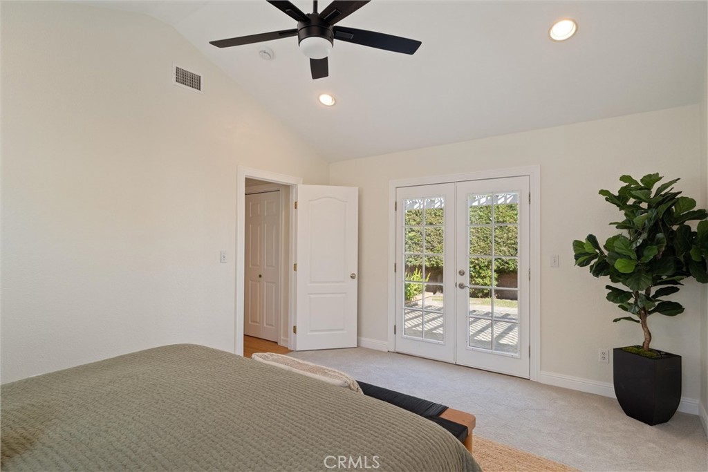 3426 Roxanne Avenue Long Beach, CA 90808 - Photo 10 of 21 a bedroom with a bed and a potted plant