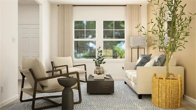 a living room with furniture and a window