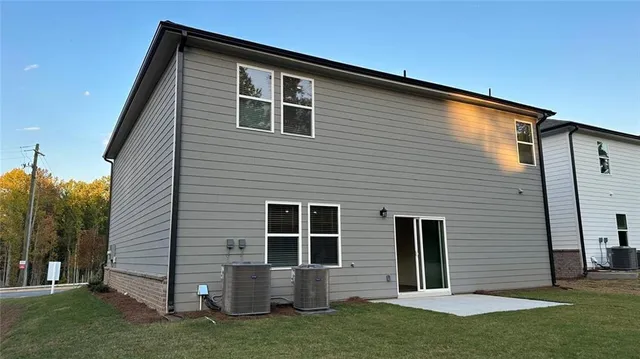 a view of a park with large trees