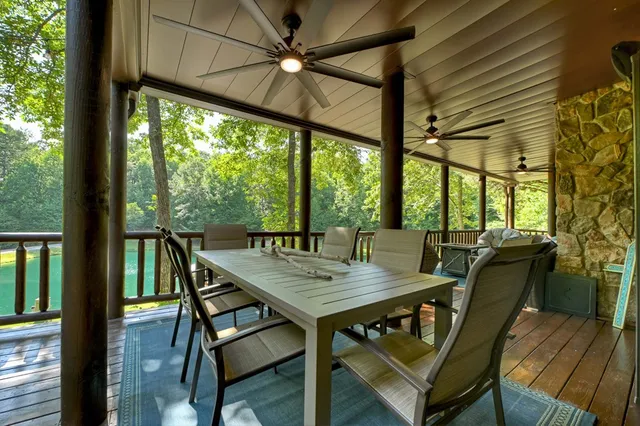 a view of a swimming pool with a patio