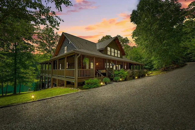 a aerial view of a house with a yard