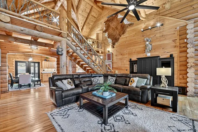 a view of a room with furniture window and wooden floor
