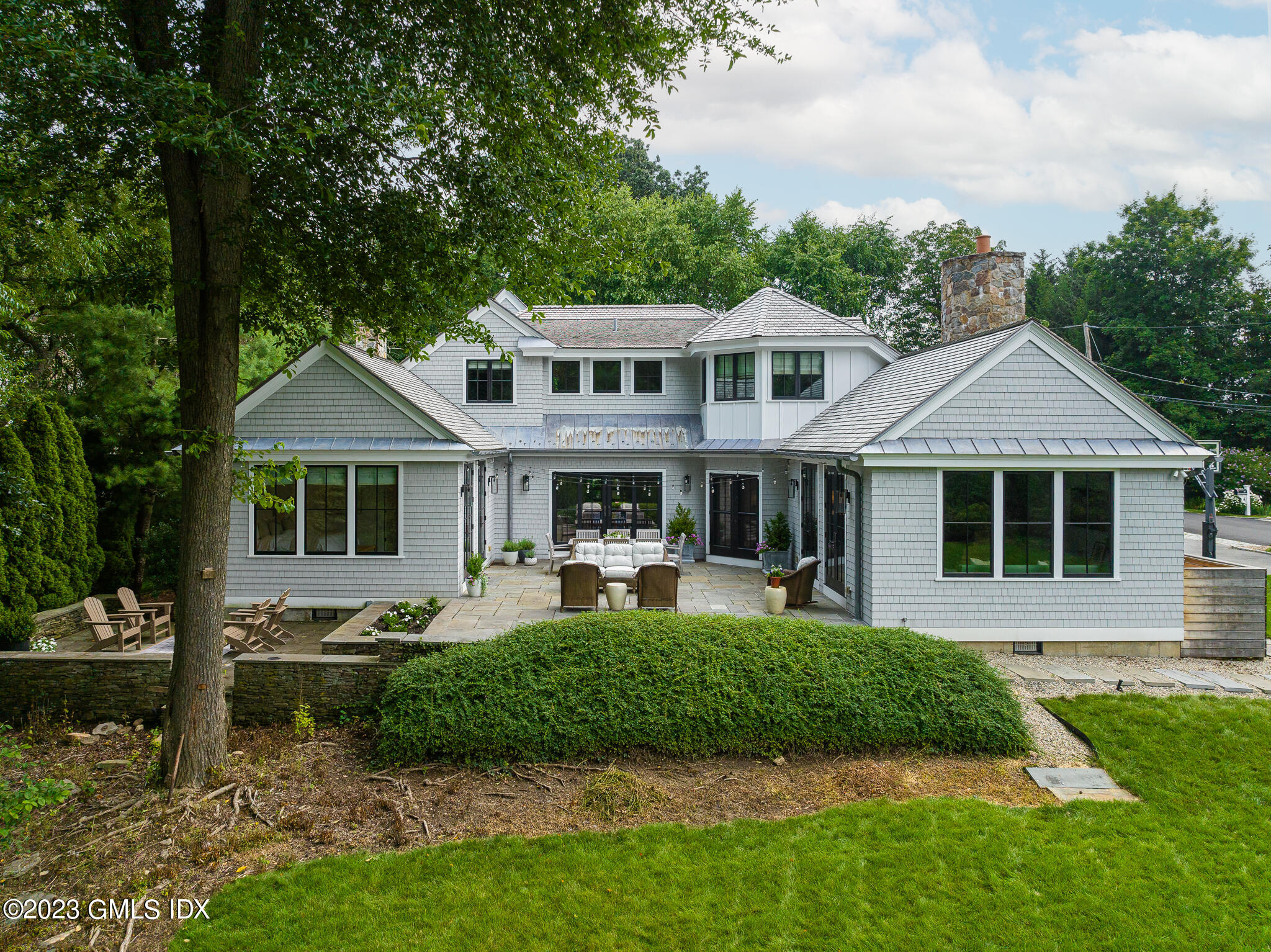 44 Cedar Cliff Road Riverside, CT 06878 - Photo 29 of 36 a front view of a house with a yard